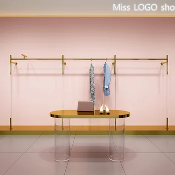 Настенная напольная вешалка для одежды на витрине магазина одежды Настенная напольная вешалка для одежды на витрине магазина одежды 0